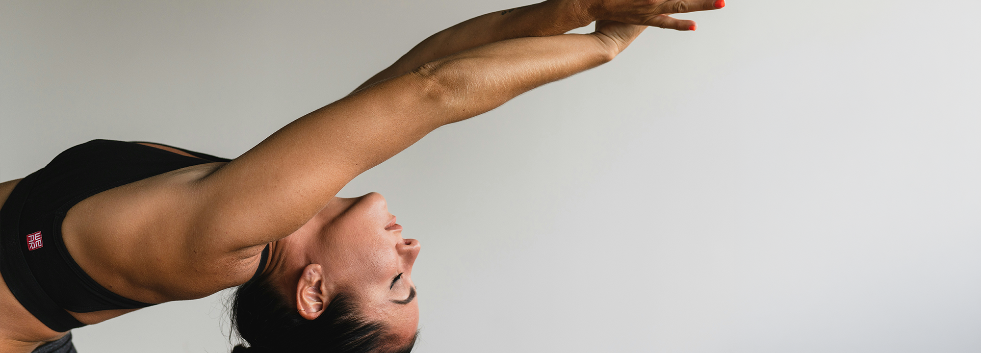 Women at the gym doing yoga