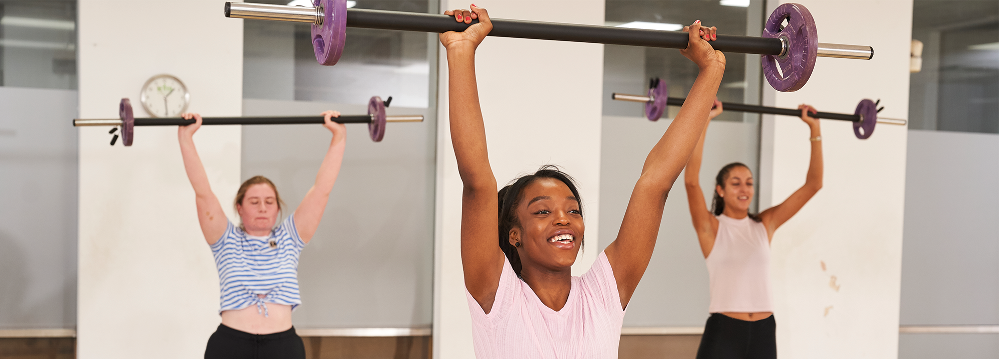 Women lifting weights