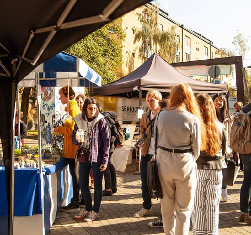 Students exploring stalls at the Welcome Fair